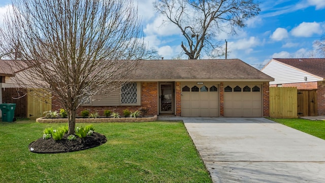 ranch-style home featuring a garage, driveway, brick siding, and a front yard