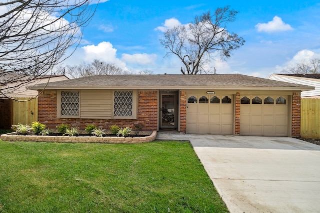 ranch-style house with a garage, brick siding, driveway, and a front lawn