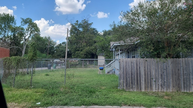 view of yard featuring fence