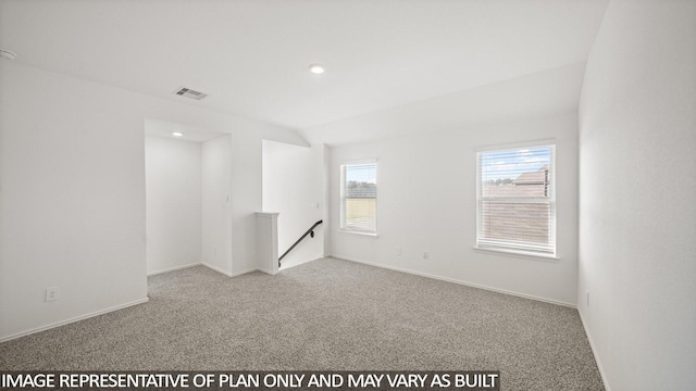 unfurnished room featuring recessed lighting, light colored carpet, visible vents, vaulted ceiling, and baseboards