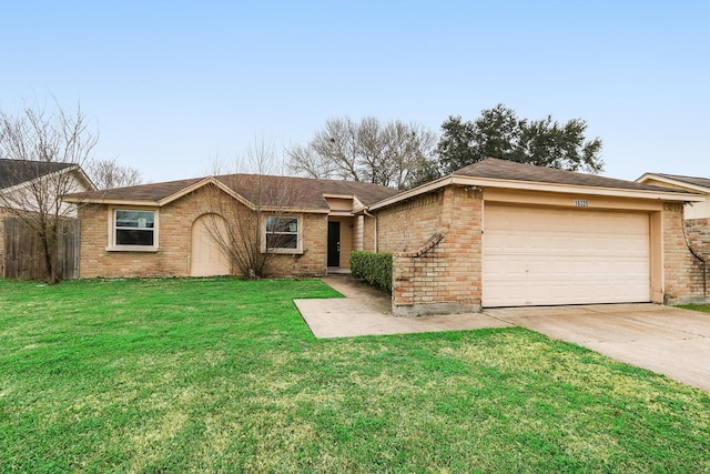 ranch-style house with a garage, driveway, brick siding, and a front yard