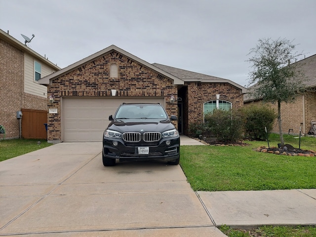 ranch-style house featuring concrete driveway, brick siding, an attached garage, and a front yard