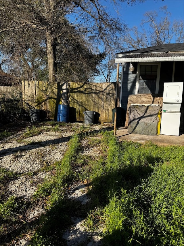 view of yard with fence