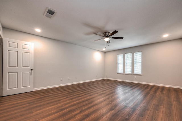 spare room with baseboards, visible vents, ceiling fan, dark wood-type flooring, and recessed lighting