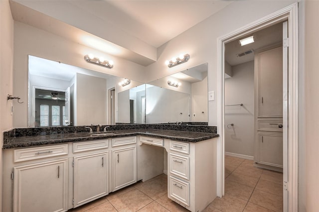 bathroom with vanity, tile patterned flooring, visible vents, and a ceiling fan