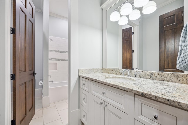 bathroom featuring tile patterned flooring, washtub / shower combination, crown molding, and vanity