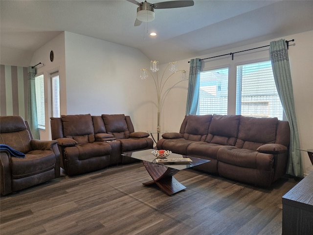 living area with a wealth of natural light, ceiling fan, lofted ceiling, and wood finished floors