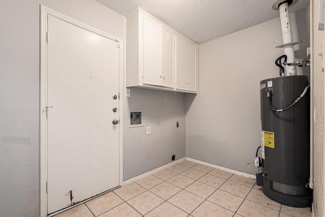 clothes washing area with washer hookup, gas water heater, cabinet space, electric dryer hookup, and a textured ceiling