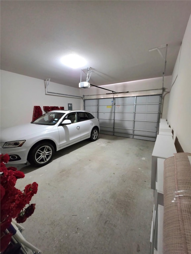 garage featuring a garage door opener