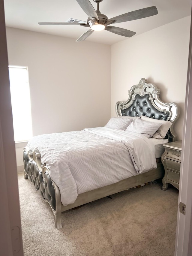 bedroom featuring carpet floors and a ceiling fan