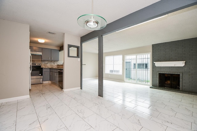 unfurnished living room with marble finish floor, a fireplace, and baseboards