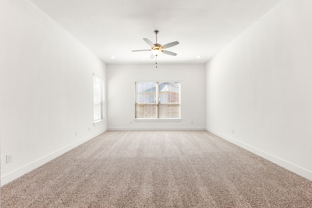 unfurnished room with recessed lighting, ceiling fan, baseboards, and light colored carpet