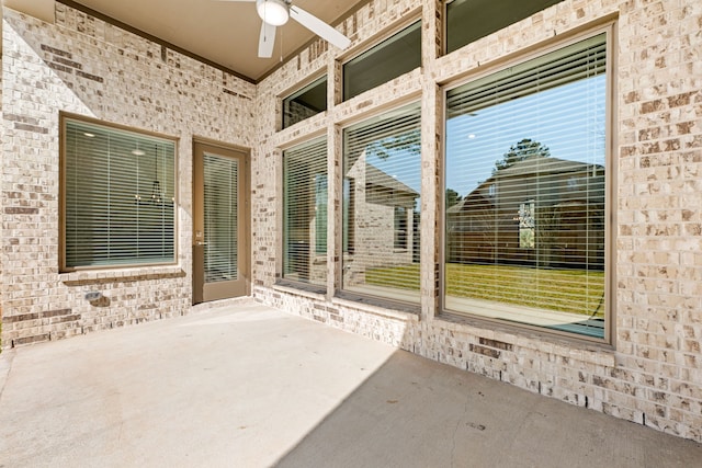 view of patio / terrace with a ceiling fan