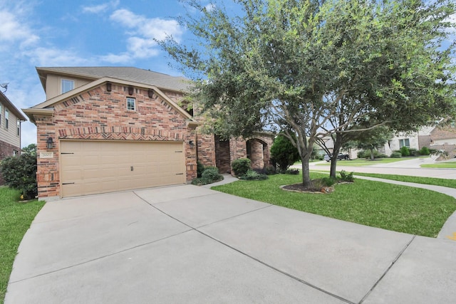 view of front facade featuring driveway, an attached garage, a front lawn, and brick siding