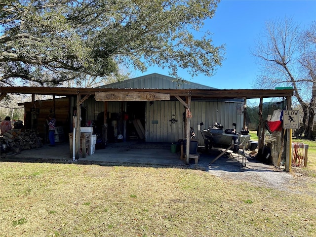 exterior space with a carport