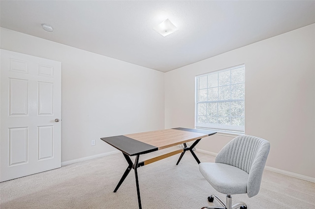 office area with baseboards and light colored carpet