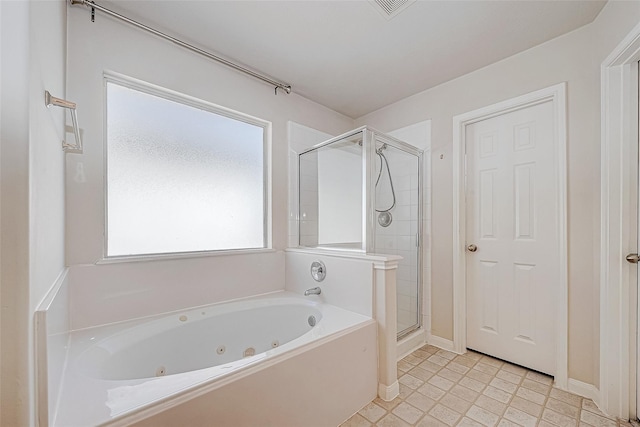 bathroom with a tub with jets, a shower stall, and visible vents