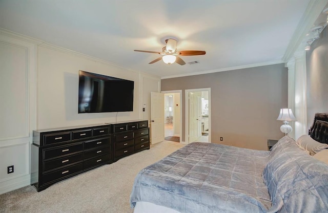 bedroom with light carpet, ceiling fan, ornamental molding, and visible vents