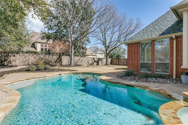 view of pool featuring a fenced in pool and a fenced backyard