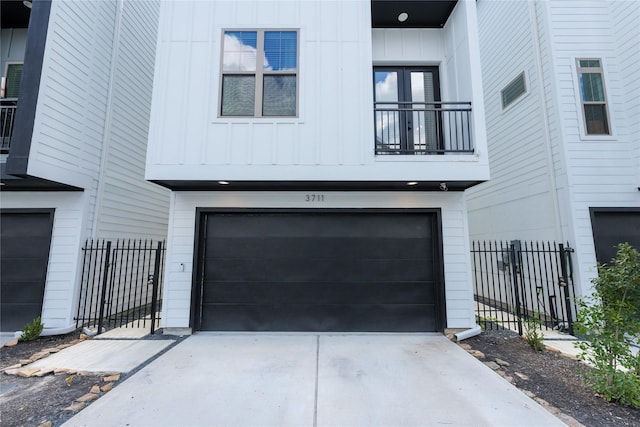 exterior space featuring driveway and fence