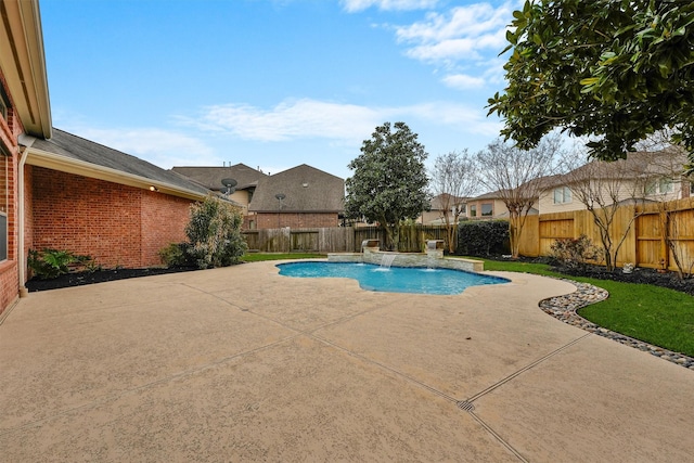 view of pool featuring a fenced backyard, a fenced in pool, and a patio