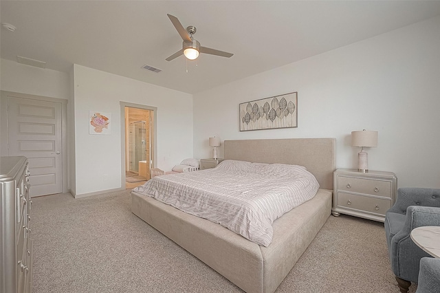 bedroom featuring light carpet, baseboards, visible vents, connected bathroom, and ceiling fan