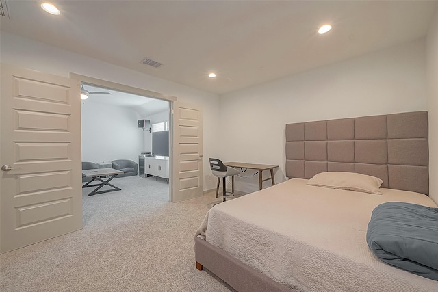 bedroom featuring carpet, visible vents, and recessed lighting