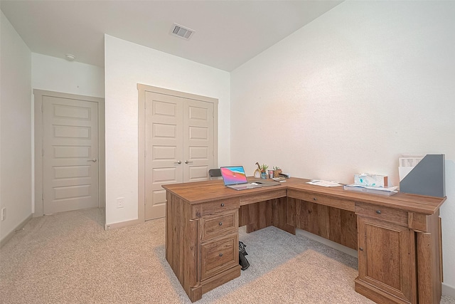 office with visible vents and light carpet