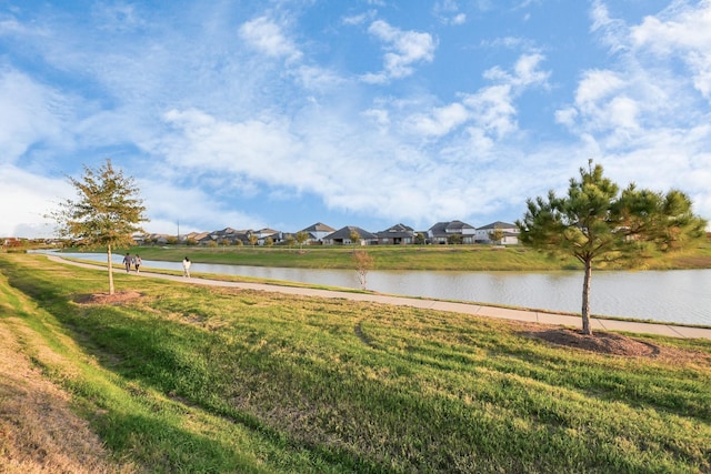 view of water feature with a residential view