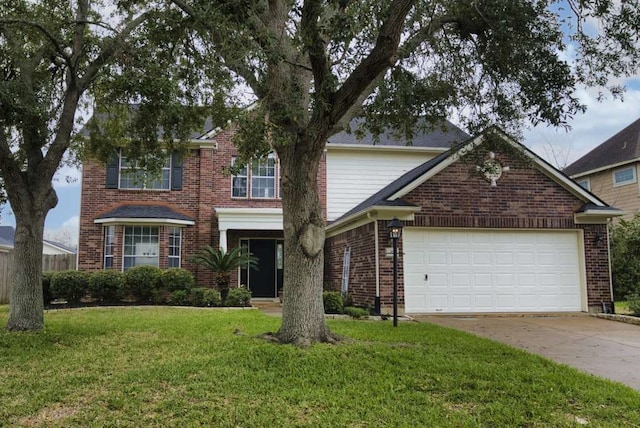 traditional-style home featuring driveway, an attached garage, a front yard, and brick siding