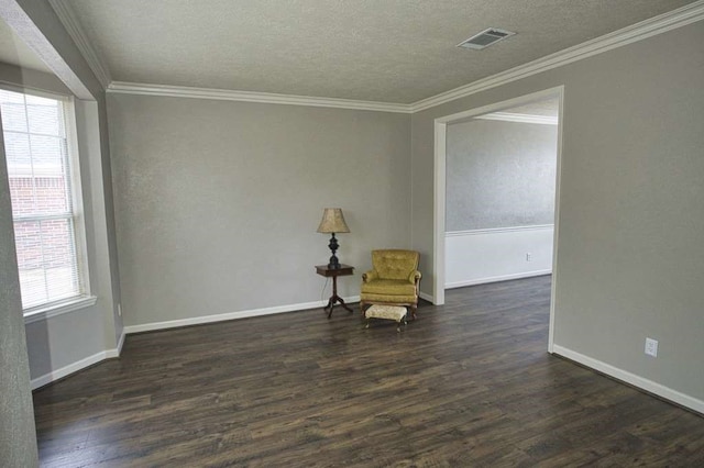 57 Sunrose Ct, Lake Jackson, TX 77566 - unfurnished room featuring ornamental molding, dark wood finished floors, and visible vents