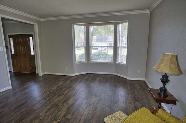 57 Sunrose Ct, Lake Jackson, TX 77566 - unfurnished living room with dark wood-style floors, baseboards, and crown molding