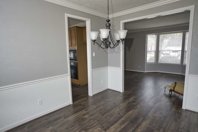 57 Sunrose Ct, Lake Jackson, TX 77566 - unfurnished dining area featuring a textured ceiling, ornamental molding, dark wood-style flooring, and an inviting chandelier