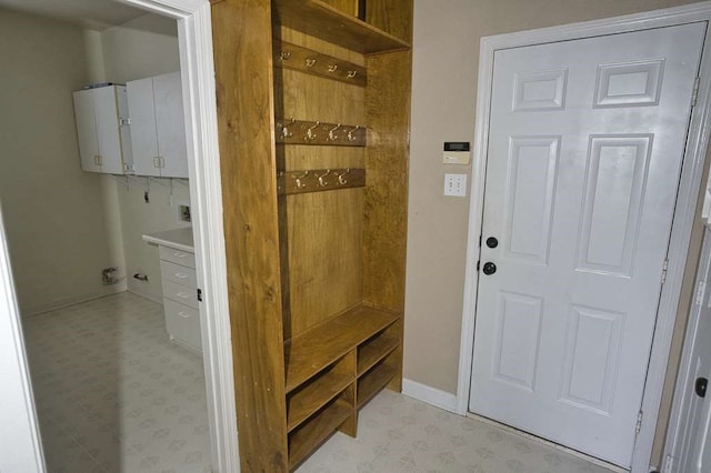 57 Sunrose Ct, Lake Jackson, TX 77566 - mudroom featuring light floors and baseboards