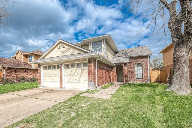 traditional home with concrete driveway, brick siding, fence, and a front lawn