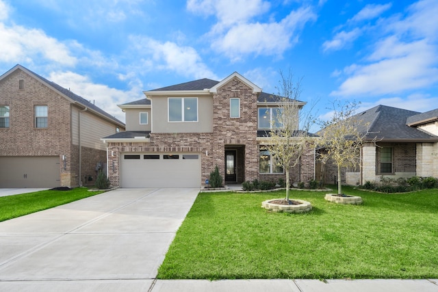 traditional-style house with brick siding, stucco siding, a garage, driveway, and a front lawn