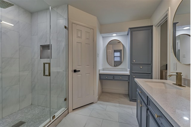 bathroom with a stall shower, marble finish floor, visible vents, and vanity