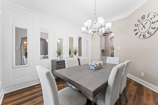 dining room with arched walkways, dark wood-type flooring, a chandelier, and crown molding