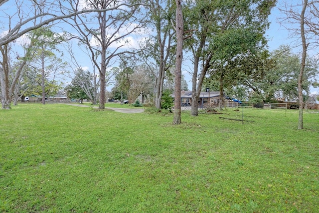 view of yard featuring fence