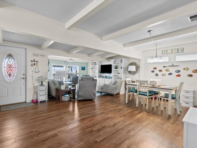 1103 White Cap Dr, Surfside Beach, TX 77541 - living room featuring wood finished floors and beamed ceiling