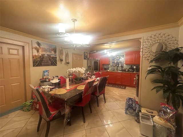 dining room with ornamental molding and light tile patterned floors