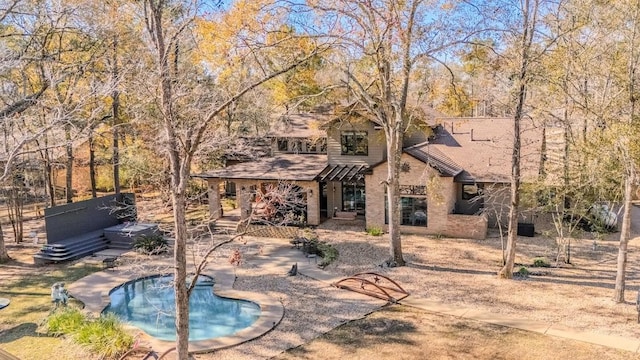 view of pool featuring a patio and a pool