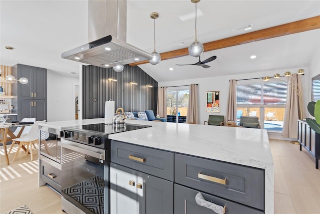 kitchen with open floor plan, hanging light fixtures, light stone countertops, island exhaust hood, and stainless steel electric range