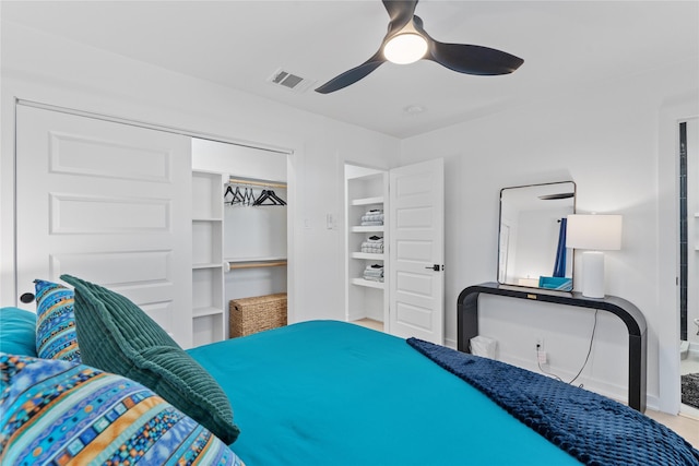 bedroom with a ceiling fan, a closet, and visible vents