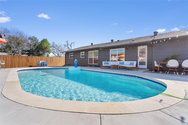 view of swimming pool featuring a fenced in pool, a patio area, and fence