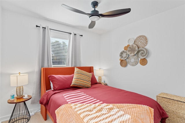 704 Emerald Wood Dr, Austin, TX 78745 - bedroom featuring wood finished floors and a ceiling fan