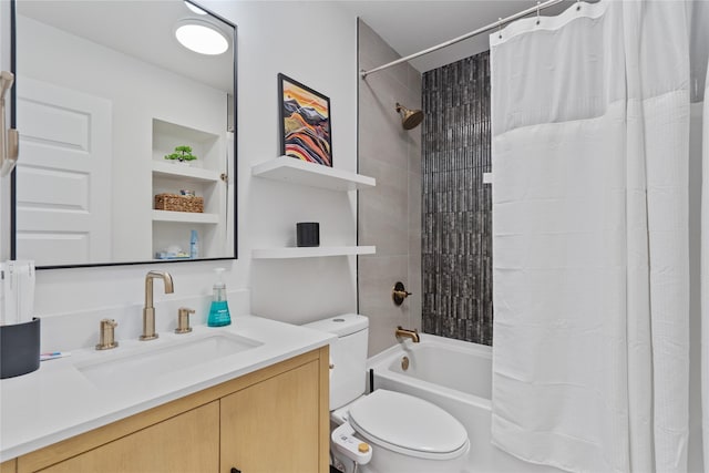 bathroom with shower / bath combination with curtain, vanity, and toilet