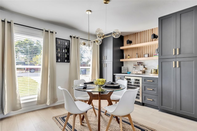 dining room with wine cooler and a bar