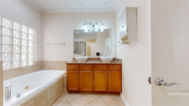 full bathroom featuring a jetted tub, crown molding, double vanity, and a sink