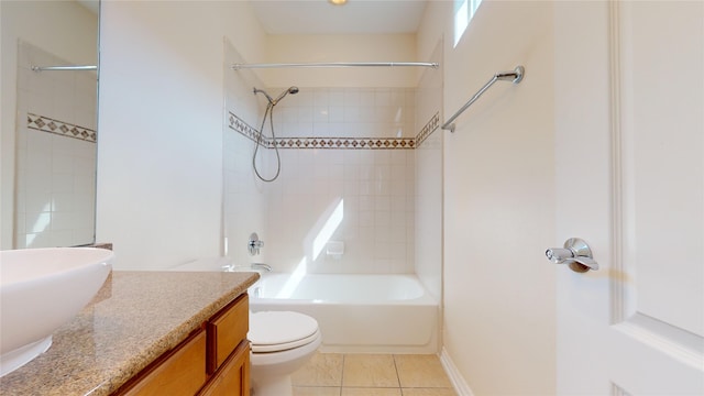 full bathroom featuring toilet,  shower combination, vanity, and tile patterned floors